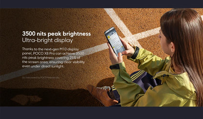 Person holding Global Version POCO X8 Pro Smartphone MTK Dimensity 8500-Ultra 6500mAh Battery 6.59" 1.5K 120Hz AMOLED Display 50MP Camera showing bright screen outdoors with text about 3500 nits peak brightness.